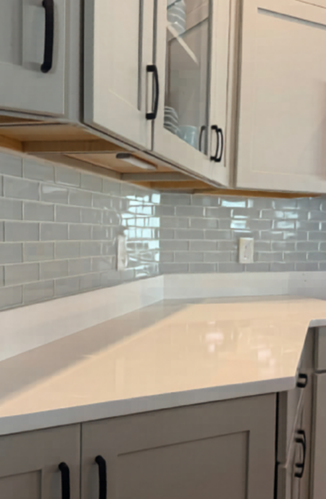 Classic neutral subway tile backsplash with precision grout work in The Villages FL.