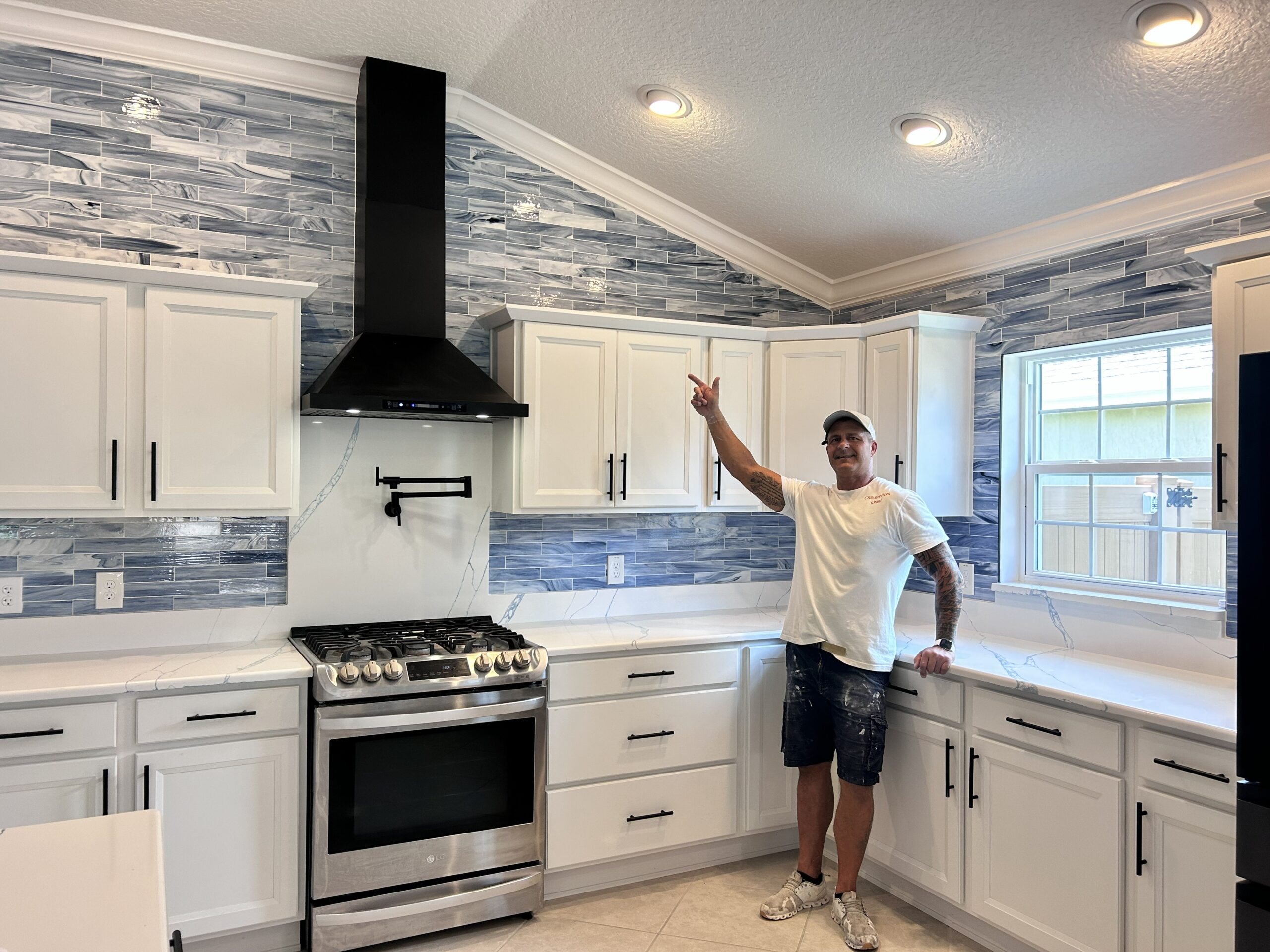 Beautiful blue full wall backsplash installed by CRB Services Pro.